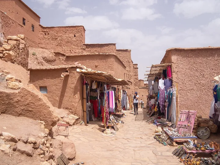 The fortified ksar of Aït Benhaddou rising above the surrounding Moroccan landscape.