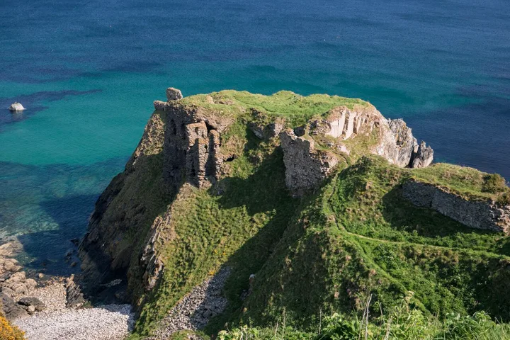Findlater Castle ruins on the Aberdeenshire coast viewed from a safe distance.