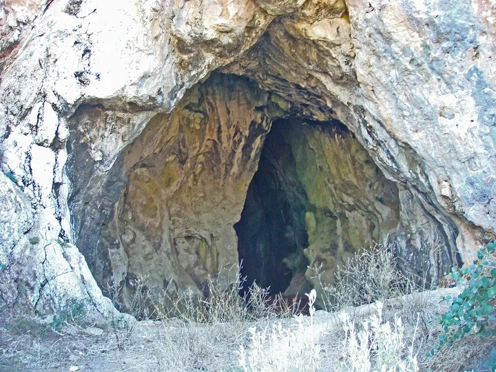Rock opening of Nestor's Cave above Voidokilia in Messinia, Greece.
