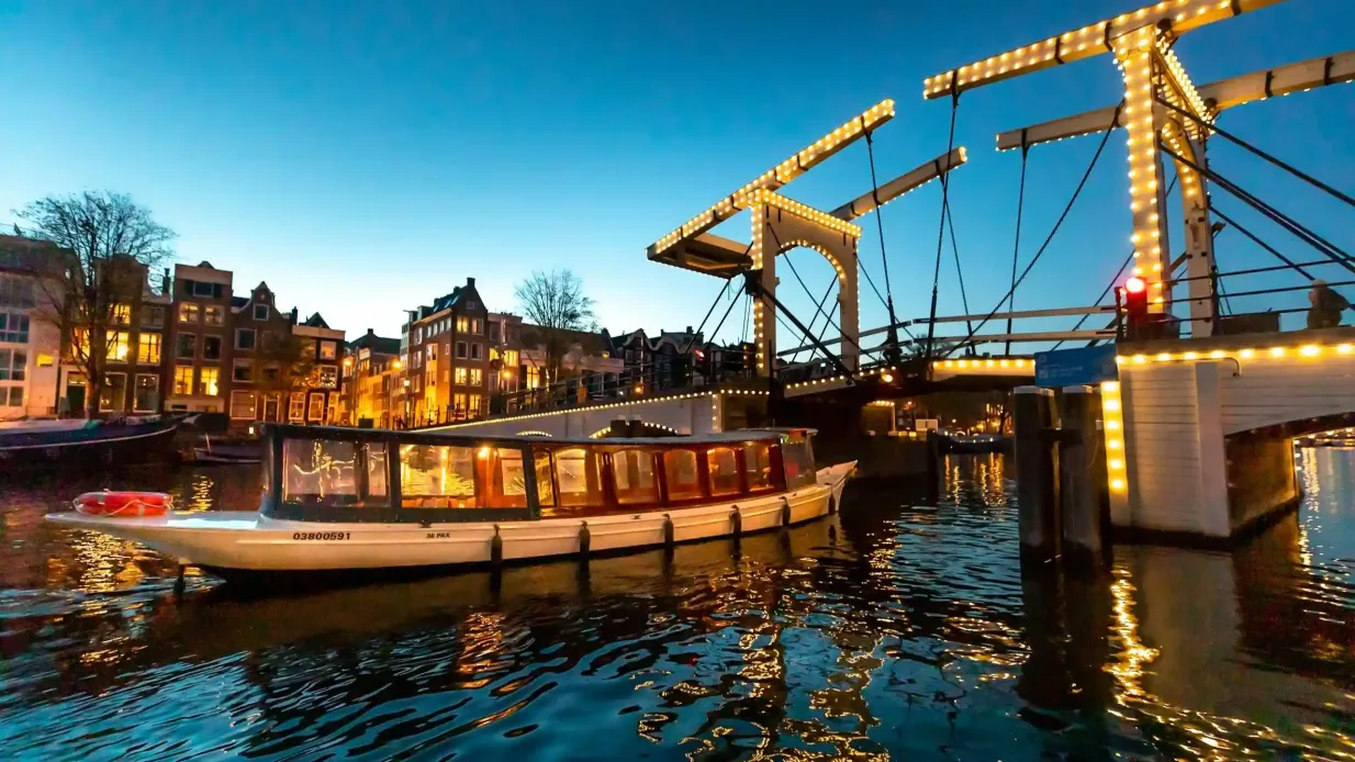 Amsterdam: Flagship Tour serale in barca aperta