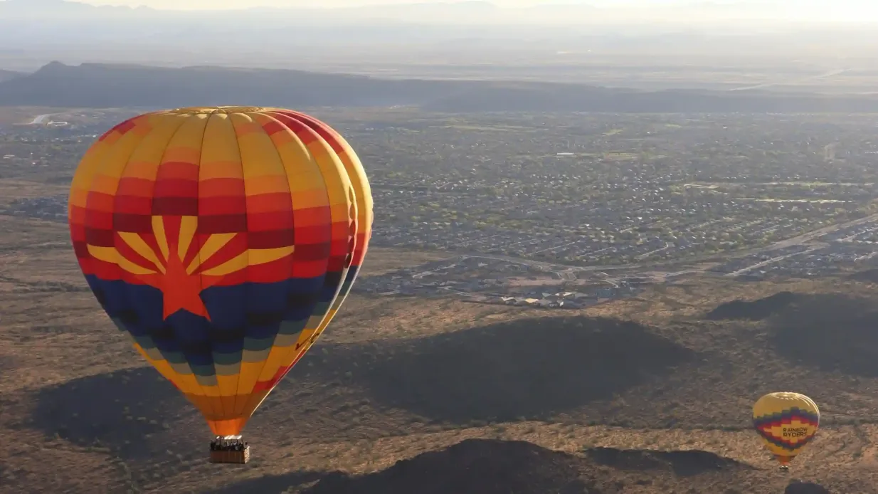 Phoenix: Guided Sunrise Hot Air Balloon Ride Provided by Rainbow Ryders Inc.