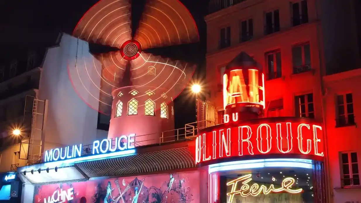 Paris: Seine River Cruise + Moulin Rouge Show with Transport