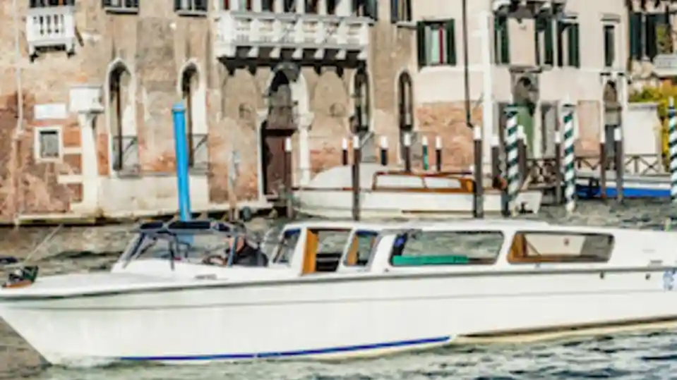 Venice: Water Taxi to Santa Lucia Station from Hotel