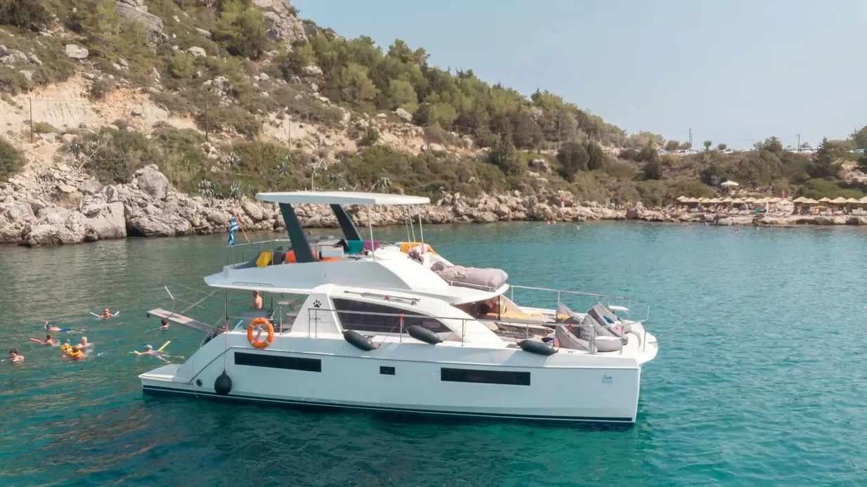 Rhodes: Power Catamaran Day Cruise with Lunch