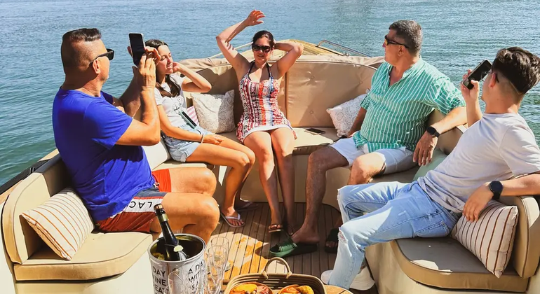 Lisbon Sunset Boat Cruise with Open Bar & Snacks Provided by Ondas Indeleveis Unipessoal lda