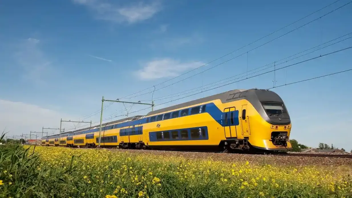Amsterdam: Train Transfer To/From Schiphol Airport and Amsterdam Provided by Distribusion Technologies GmbH (EUR)